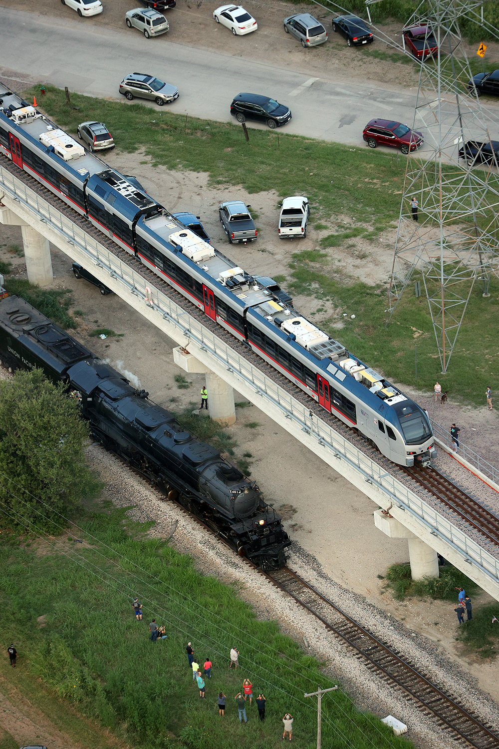 The Big Boy steam locomotive shares a scene with light rail equipment.