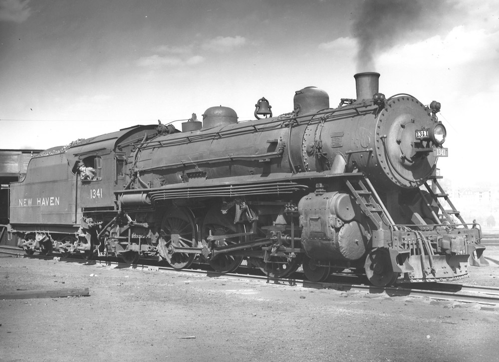 Black-and-white right-side photo of 4-6-2 steam locomotive
