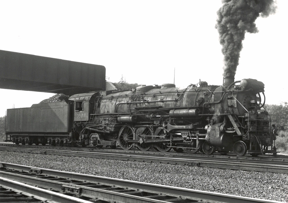 Black-and-white right-side photo of 4-8-2 steam locomotive