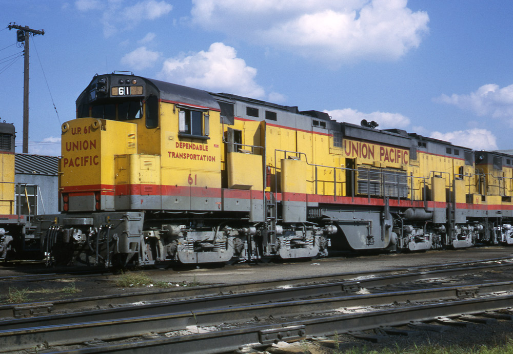 Broadside color photo of Union Pacific road-switcher diesel locomotive.