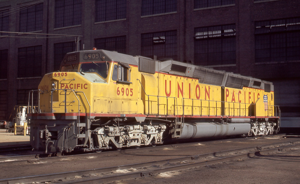 Broadside color photo of Union Pacific road-switcher diesel locomotive.