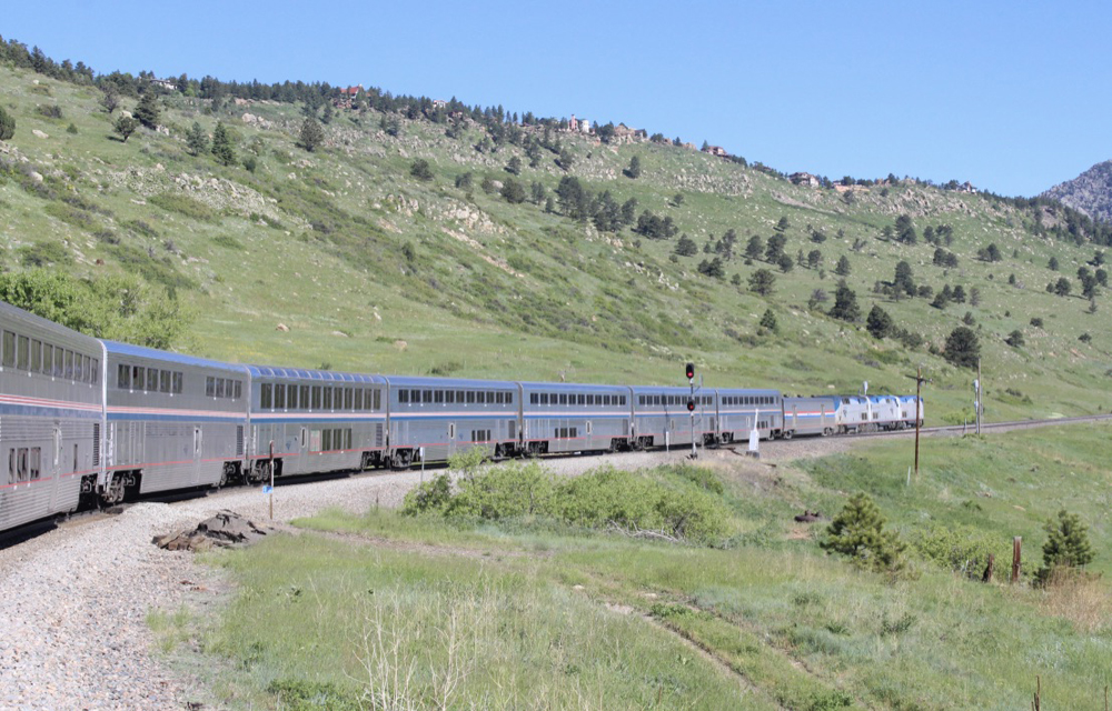 Passenger train with bilevel equipment on curve