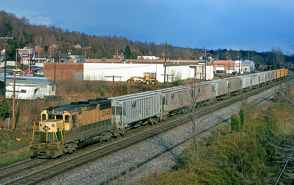Color photo of road-switcher diesel locomotive with Reading Company freight train