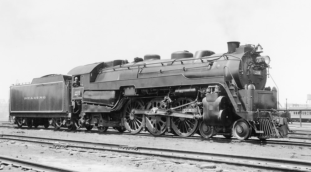 Black-and-white right-side photo of 4-6-2 steam locomotive at rest