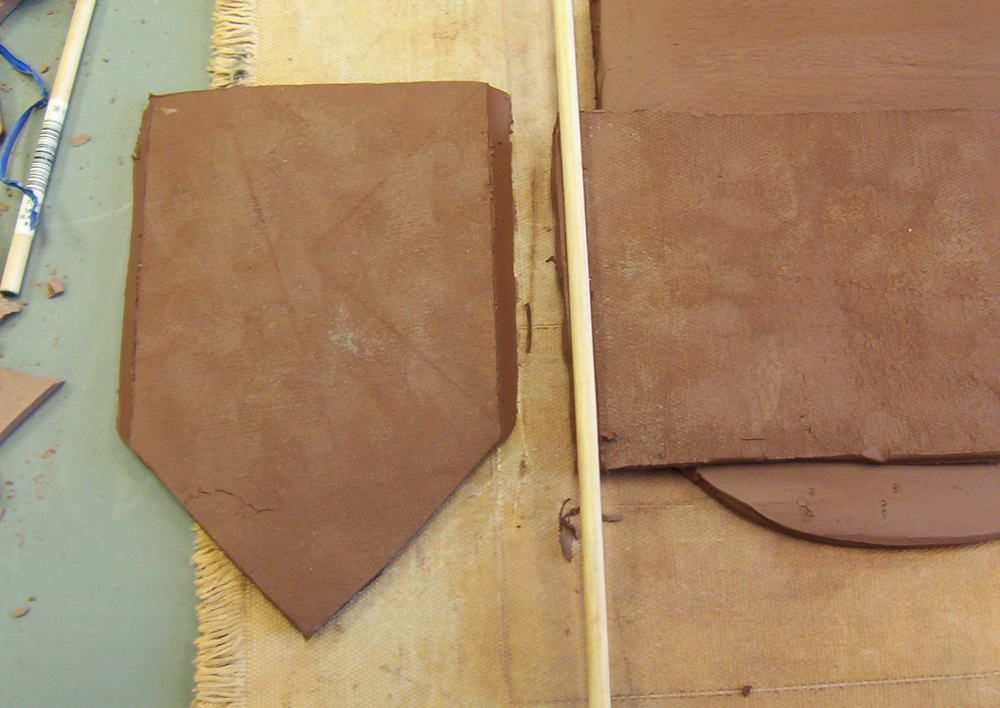 Two pieces of a clay building