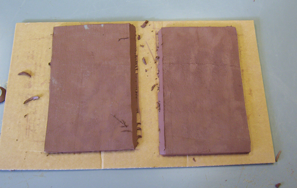 Two clay roof pieces