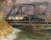 A geared steam locomotive leads a lumber train over a steel trestle above a creek