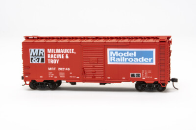Model railroad locomotive, freight car, structure, passenger equipment, track, and club announcements for November 4, 2021