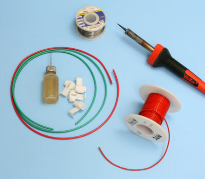 How do I find a source for thin metal strip for layout wiring?