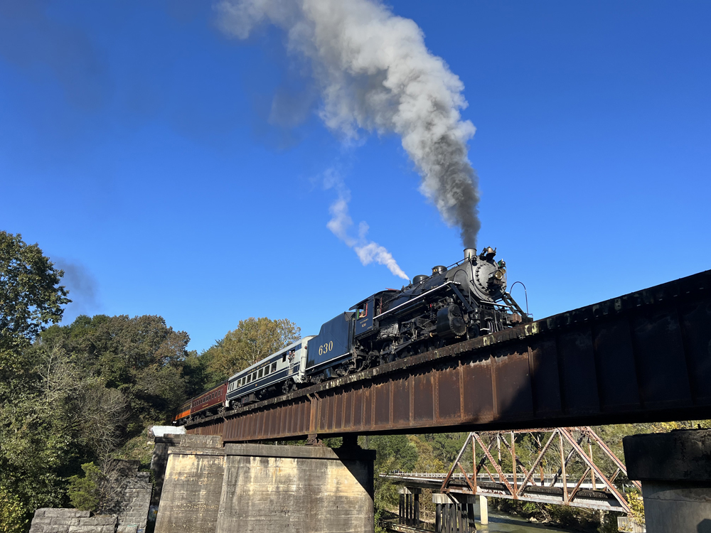 Steam locomotive on bridge