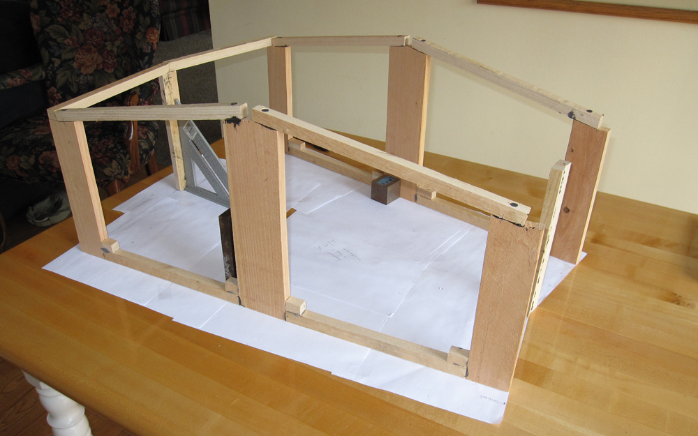 Wood frame of model engine house