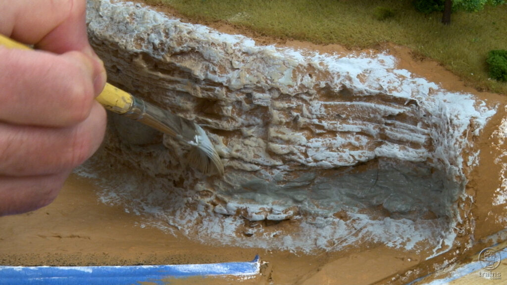 Using drybrushing techniques to add color to rubber rock castings