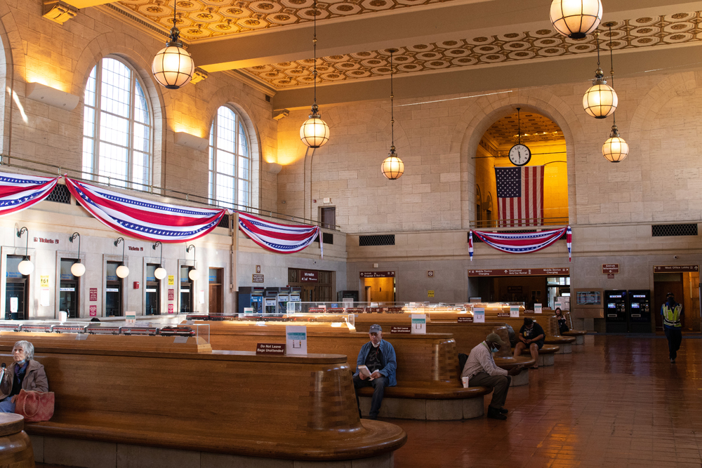 Ornate, high-ceiling train station waiting room