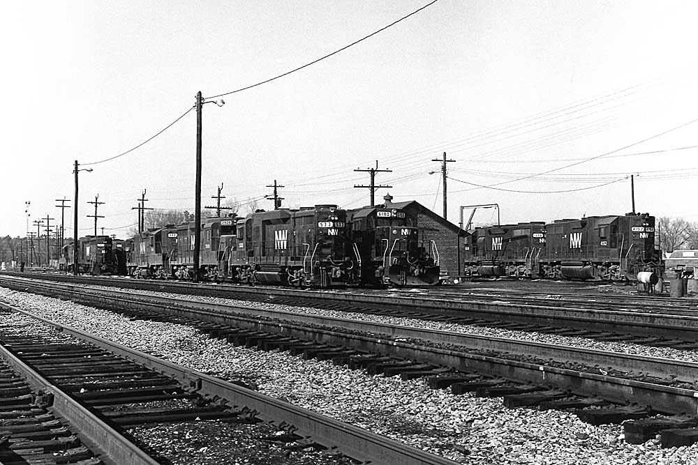 Diesel locomotives line up in yard