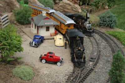 A 1930s-era garden railroad set in the western countryside