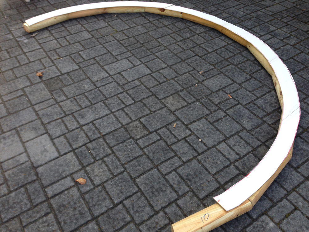 Foam board on top of curved timber pieces