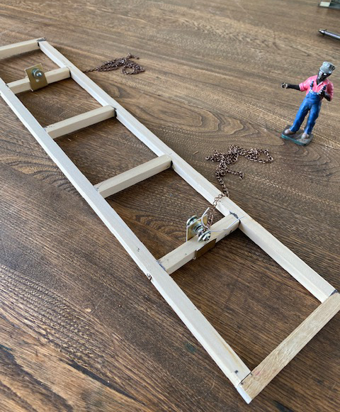 wood model of a grappler carriage