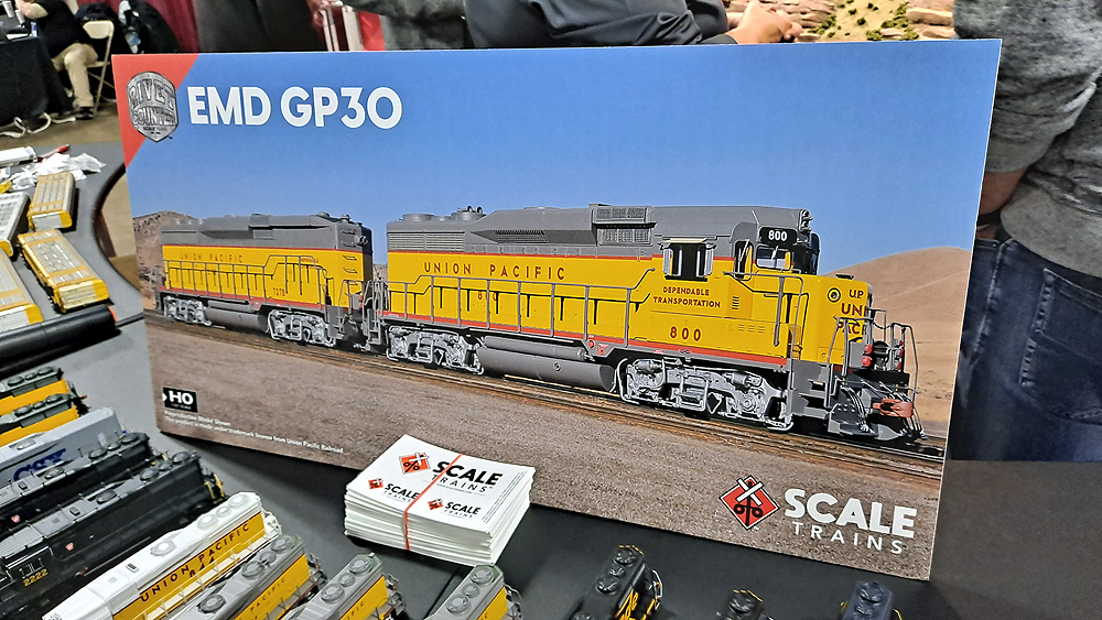Sales board showing ScaleTrains.com yellow and gray Union Pacific GP30 and GP30B.