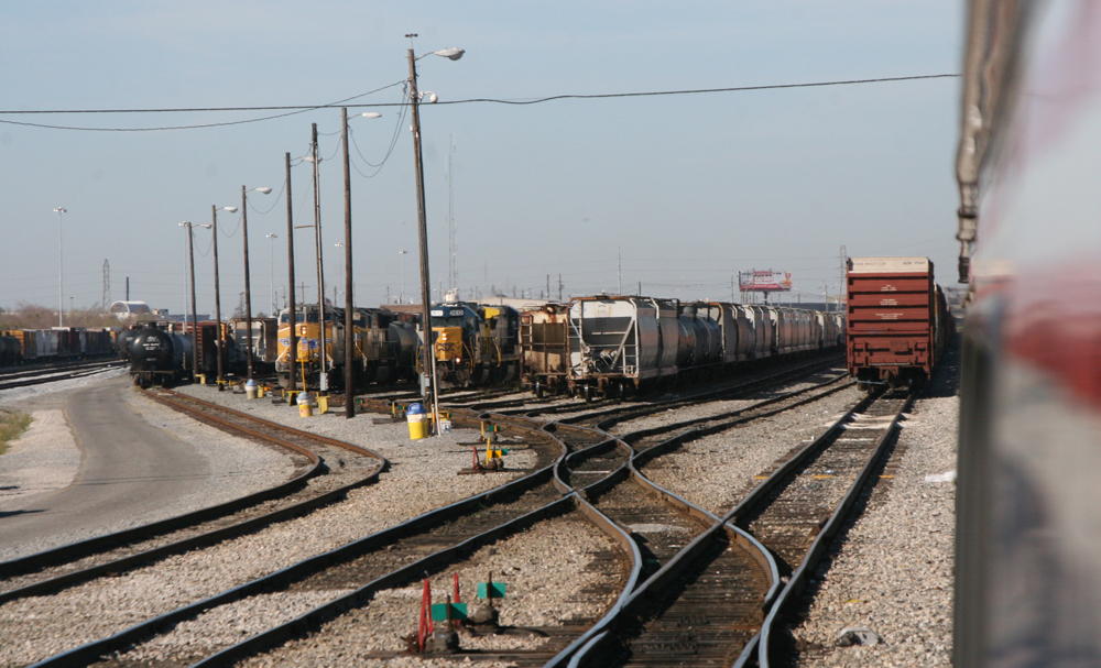 View of railyard from passenger car