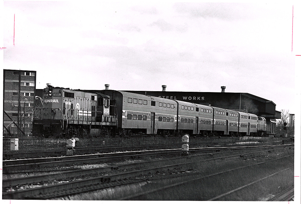 Conrail passenger trains: Locomotive with passenger train.