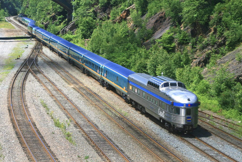 Passenger train with stainless steel dome-observation car