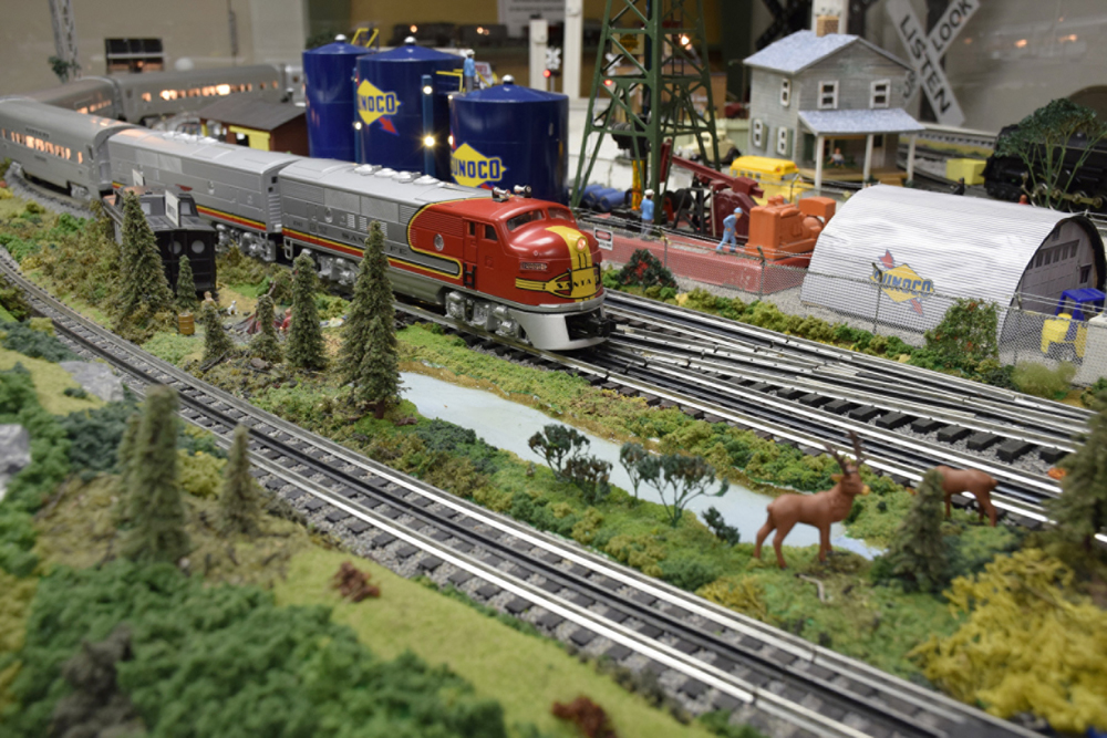 Santa Fe F3 on a track with deer nearby