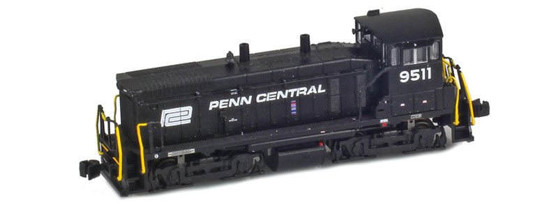 Photo of Z scale Electro-Motive Division SW1500 painted black with white graphics and yellow vertical handrails.
