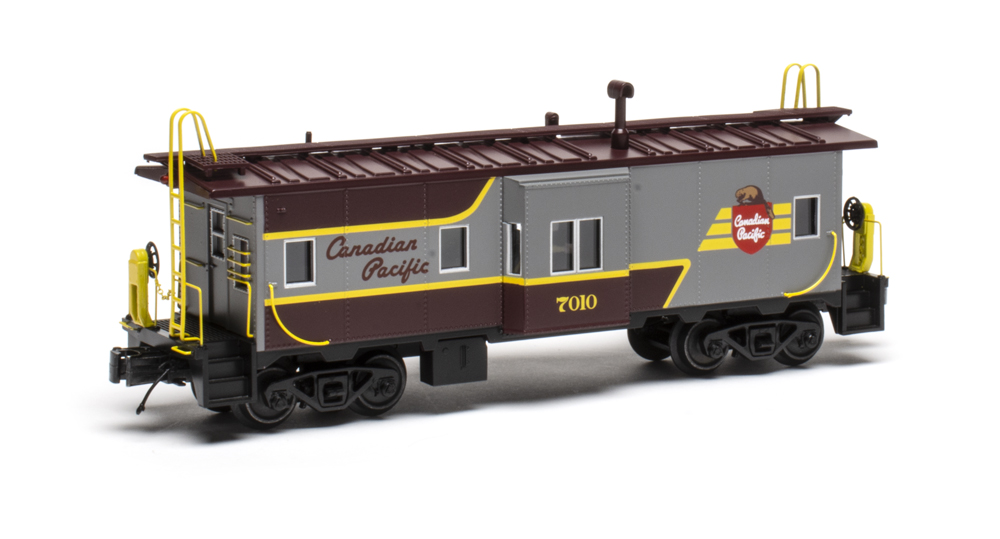 brown, gray, and yellow caboose