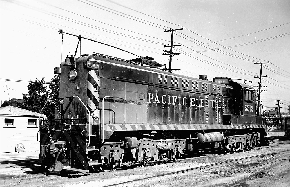 Baldwin locomotive with trolley poles at each end.