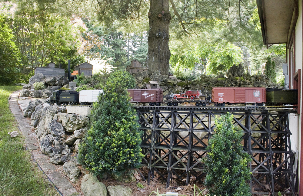 Locomotive on trestle in garden railway