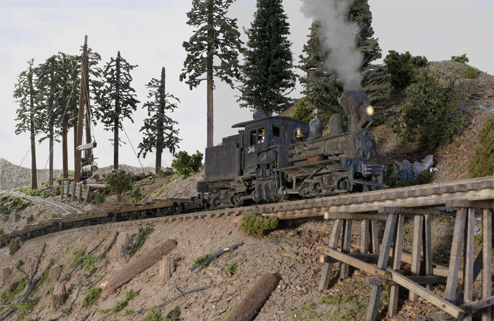 A heavily weathered geared steam locomotive works upgrade over a wood trestle in a logging area
