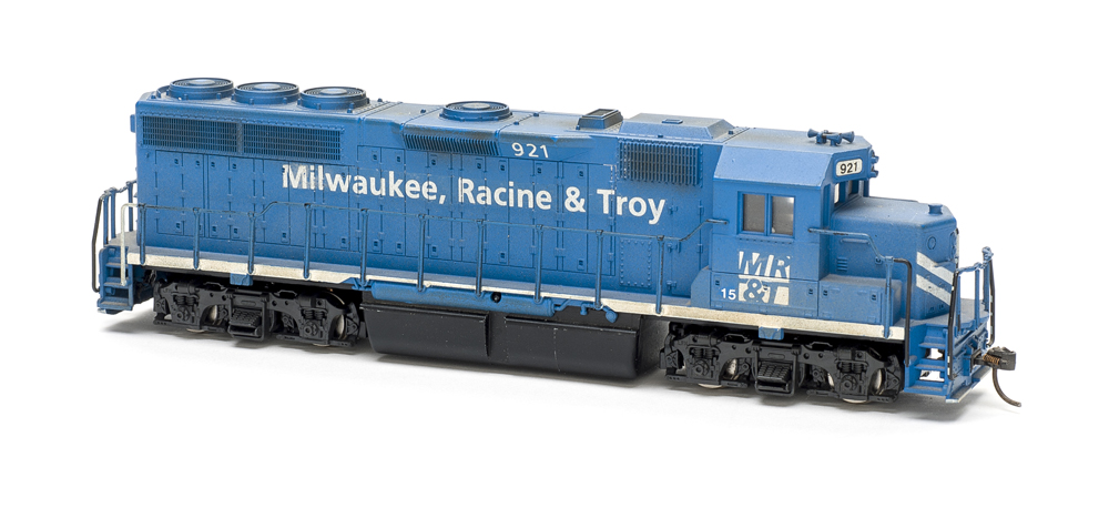 HO scale four-axle road unit painted blue with white graphics.
