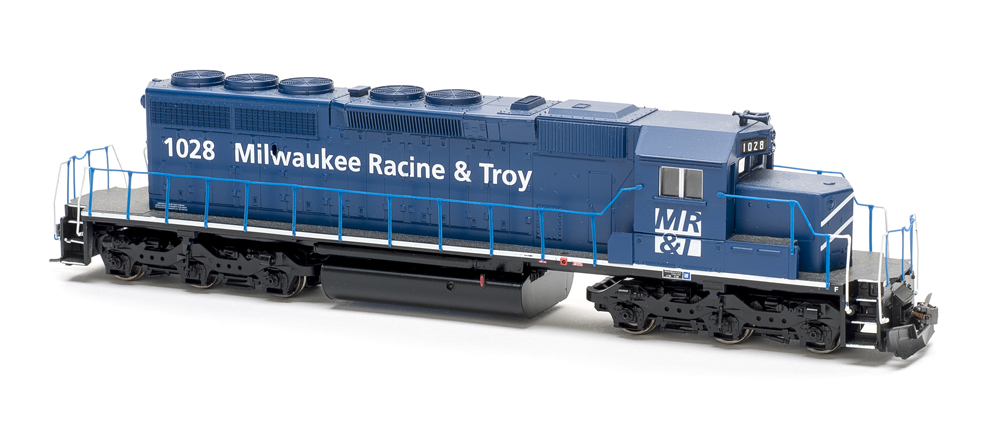 Photo of dark blue road locomotive on white background