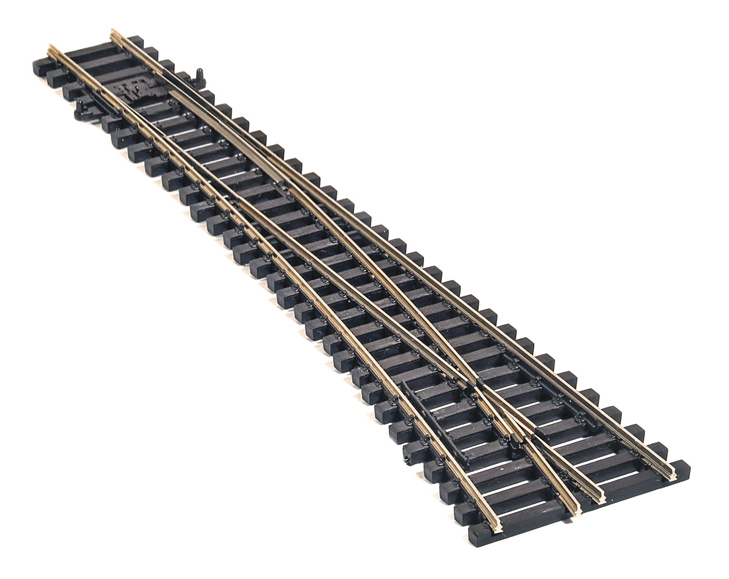 Photo of model train turnout on white background