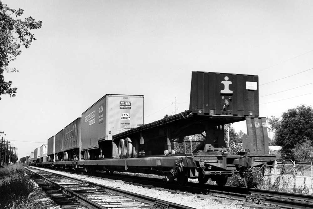 Rear of freight train carrying truck trailers