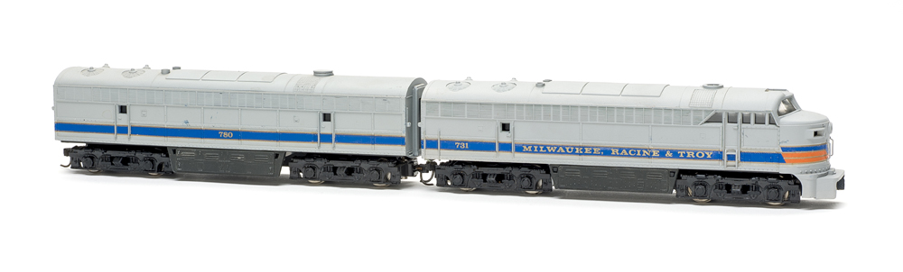Photo of two HO scale Fairbanks-Morse passenger units on white background.