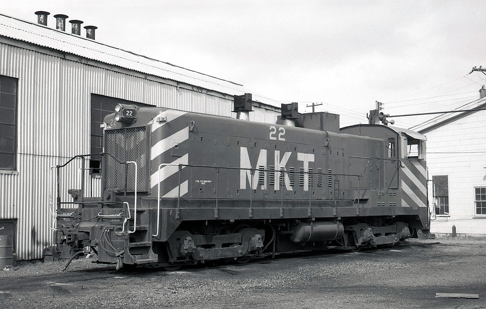 Black-and-white image of an end-cab switcher.
