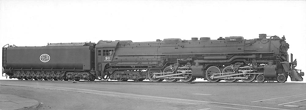 Lengthy steam locomotive in profile