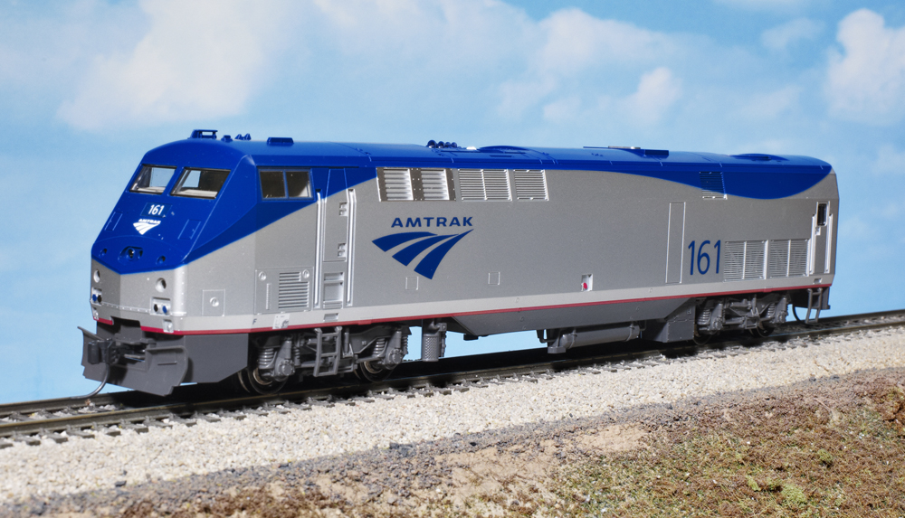 Photo of modern HO scale passenger locomotive on scenicked base