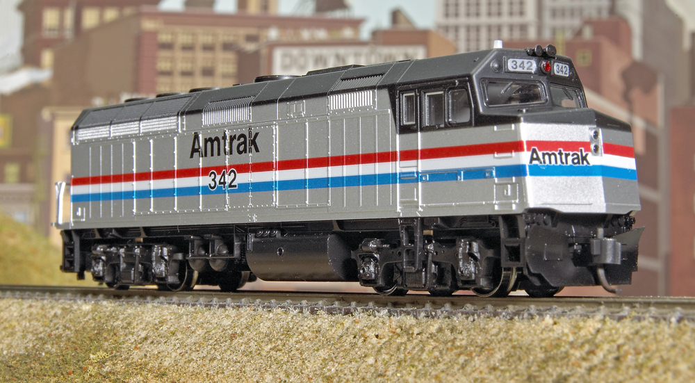 Photo of N scale passenger locomotive on scenicked base