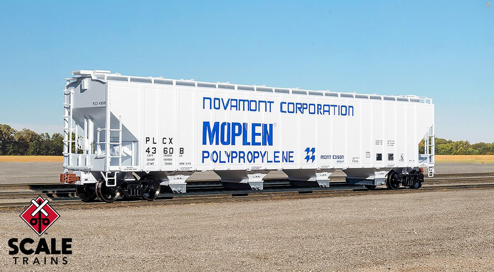Photo of HO scale covered hopper painted gray with blue and black graphics on scenicked base.