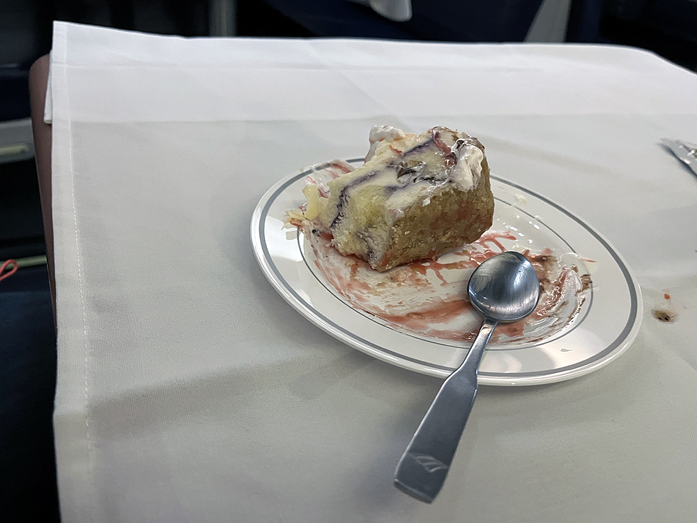 Non chocolate desert on a plate with a fork.
