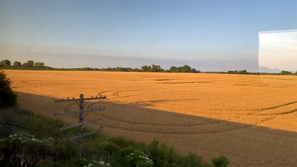 View of prairie from a dining car window.