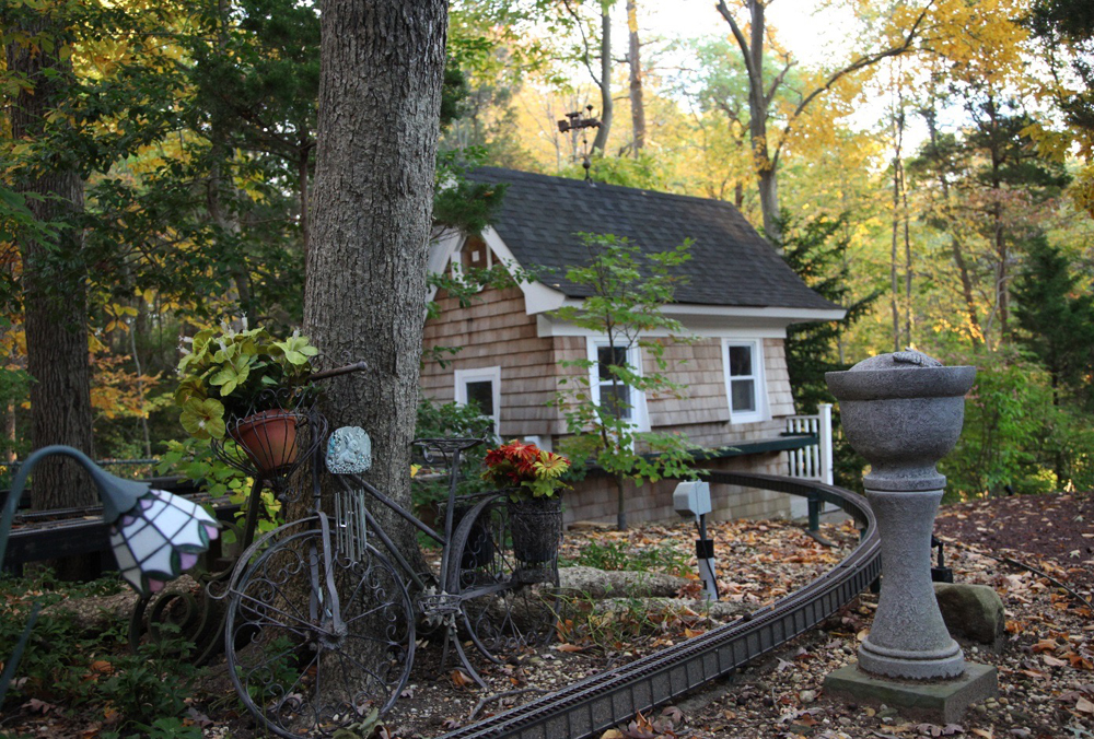 storage shed near a garden railway