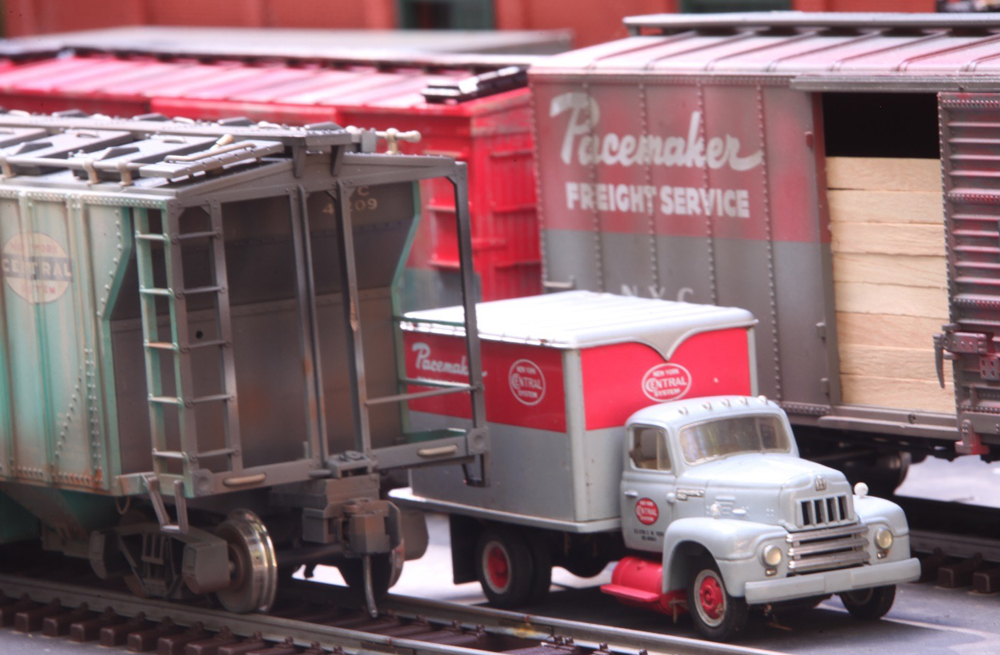 model truck near covered gondola