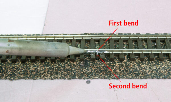 Bending and soldering track feeders to your rails