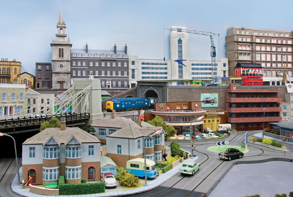 Cars traverse roundabout under large city buildings