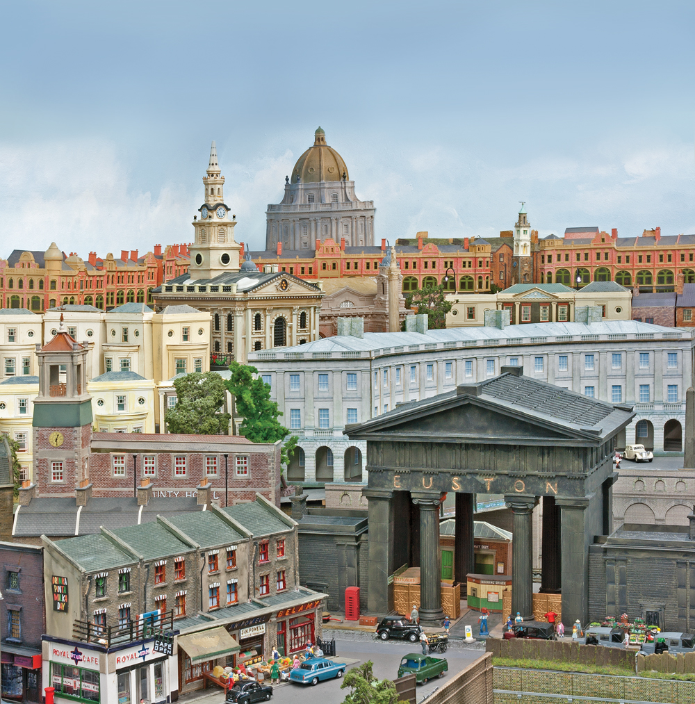A city scene with many 20th century and older buildings.