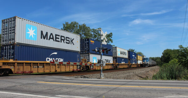 Amtrak’s Maple Leaf overtakes a freight train