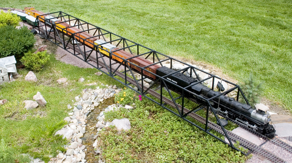 steam locomotive on bridge